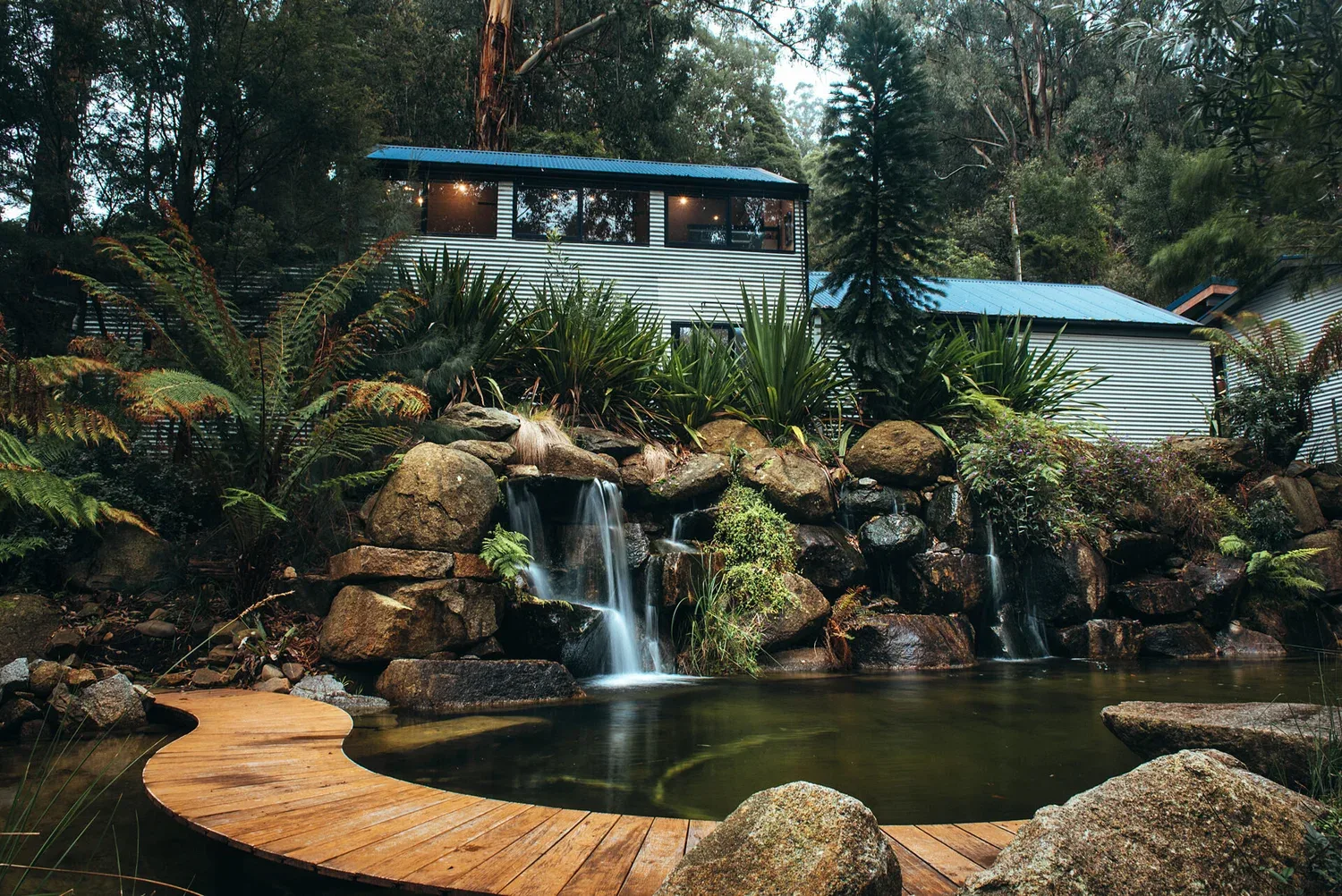 The curved pool edge and waterfalls at Billabong Falls.